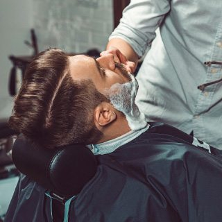 demo-attachment-146-hipster-client-visiting-barber-shop-P349LDW